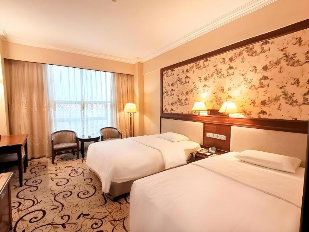 Fenggang Gladden Hotel Tiantangwei Ngoại thất bức ảnh